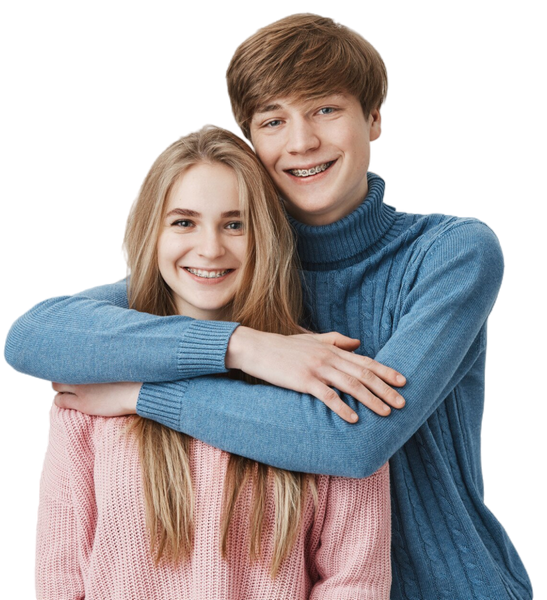 Boy and a girl are smiling and hugging