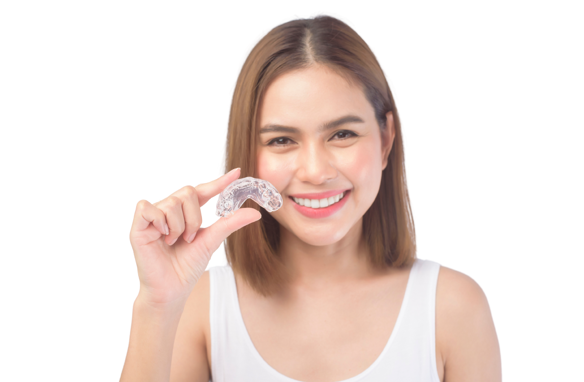 Transform Your Smile with Clear Braces: Unleash the Power of Invisible Alignment Today! A boy in a blue sweater is happily smiling